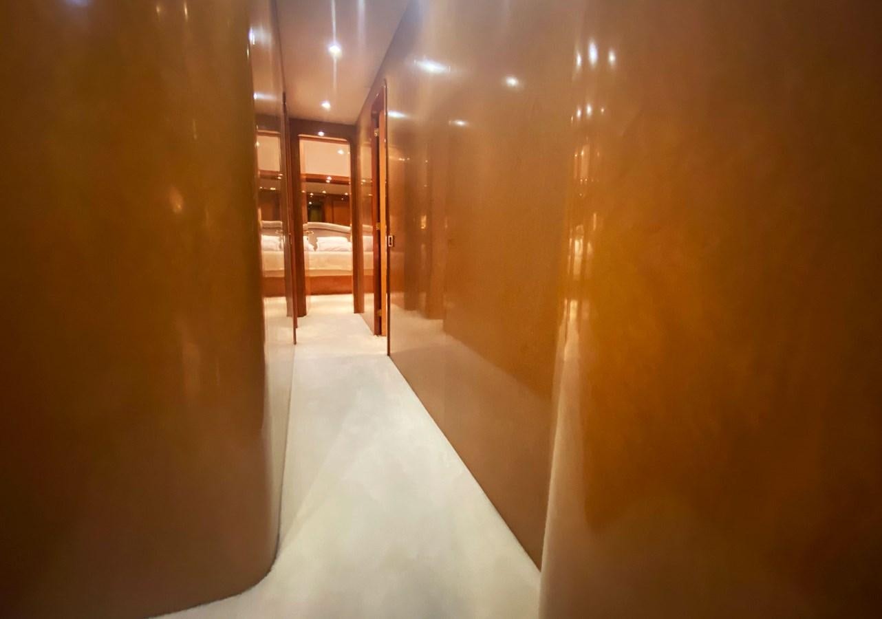 a hallway with a white floor aboard GRAN FINALE II Yacht for Sale