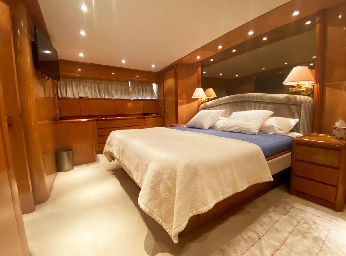 a bed in a room aboard GRAN FINALE II Yacht for Sale
