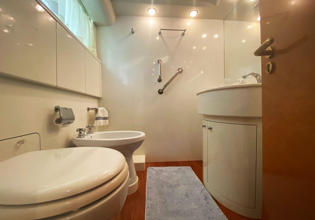 a bathroom with two sinks aboard GRAN FINALE II Yacht for Sale