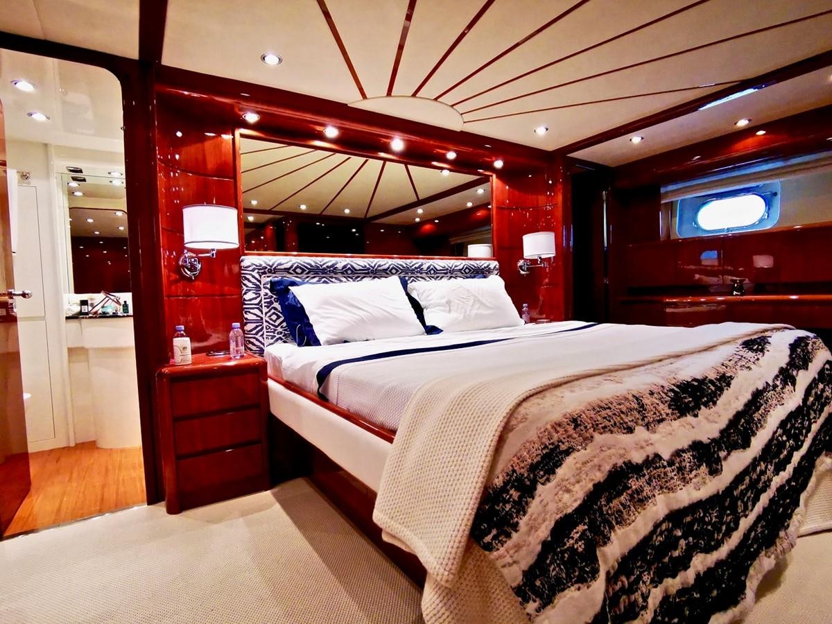 a bed in a room aboard V BOYS Yacht for Sale
