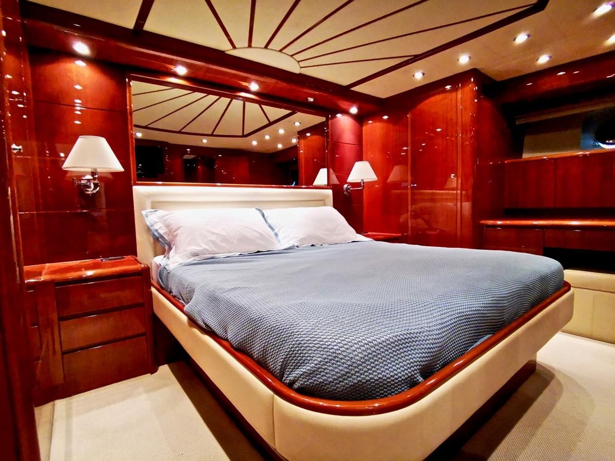 a bed in a room aboard V BOYS Yacht for Sale
