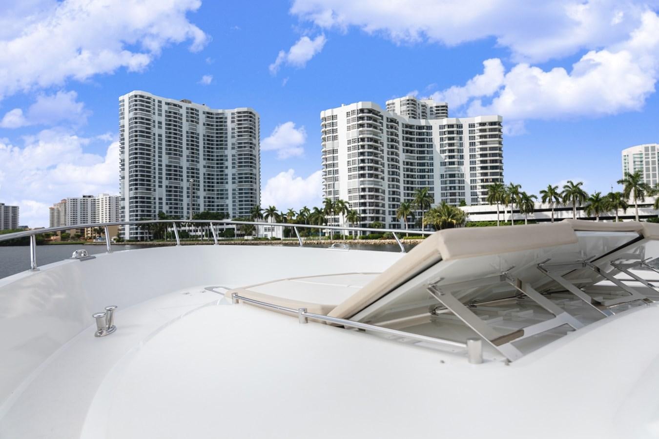 a large white building with a bridge over it aboard OCEAN ROSE Yacht for Sale