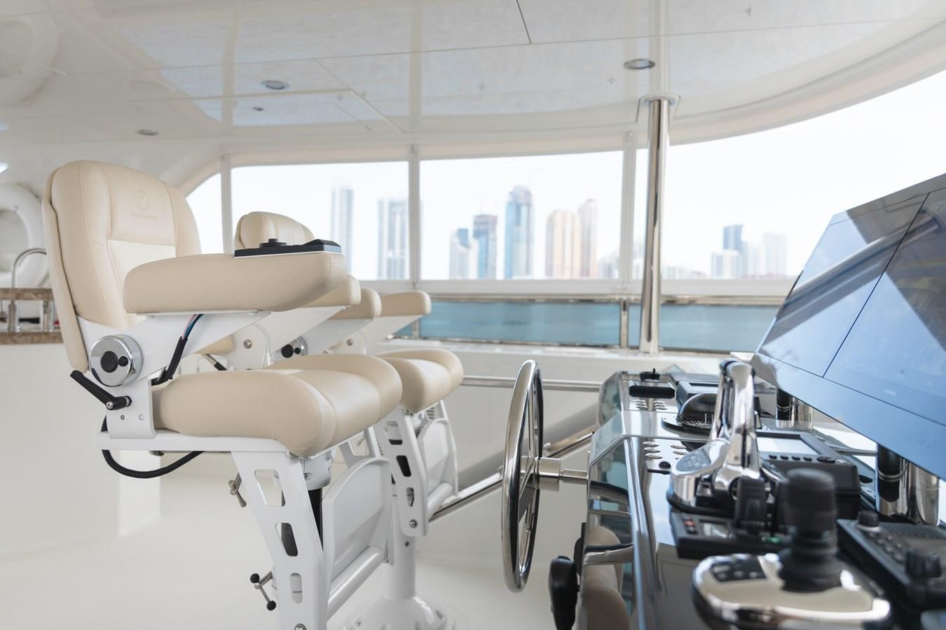 a room with a large window and a view of the city aboard OCEAN ROSE Yacht for Sale