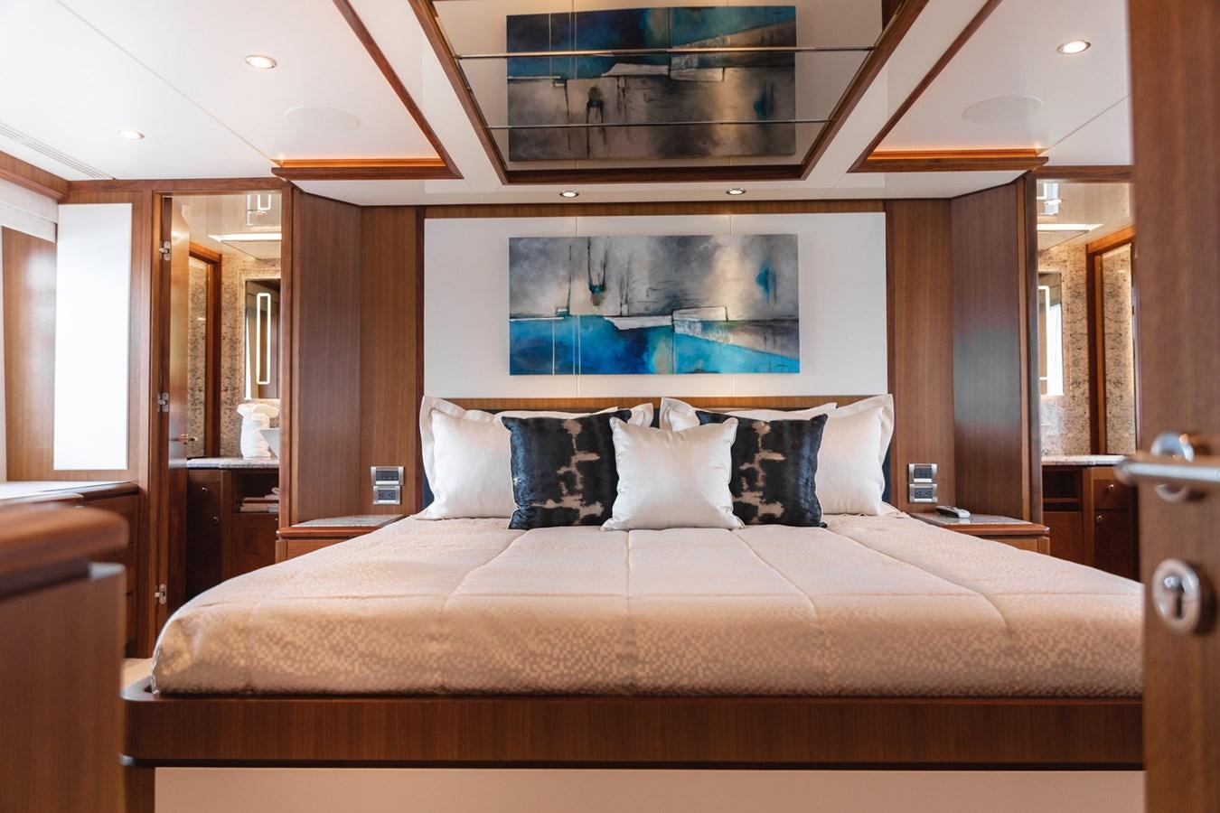 a bed with pillows aboard OCEAN ROSE Yacht for Sale