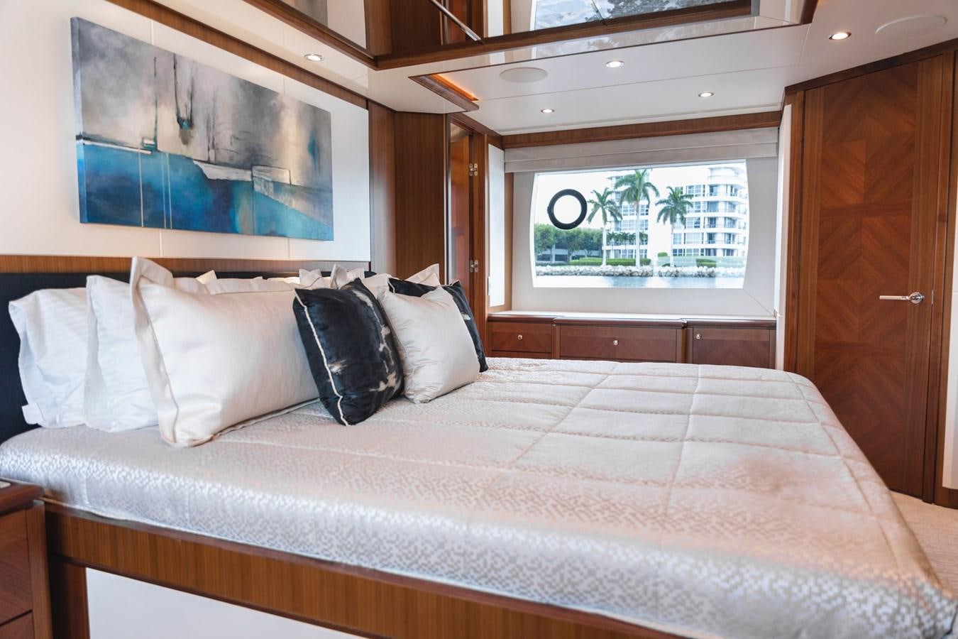 a bed with pillows aboard OCEAN ROSE Yacht for Sale