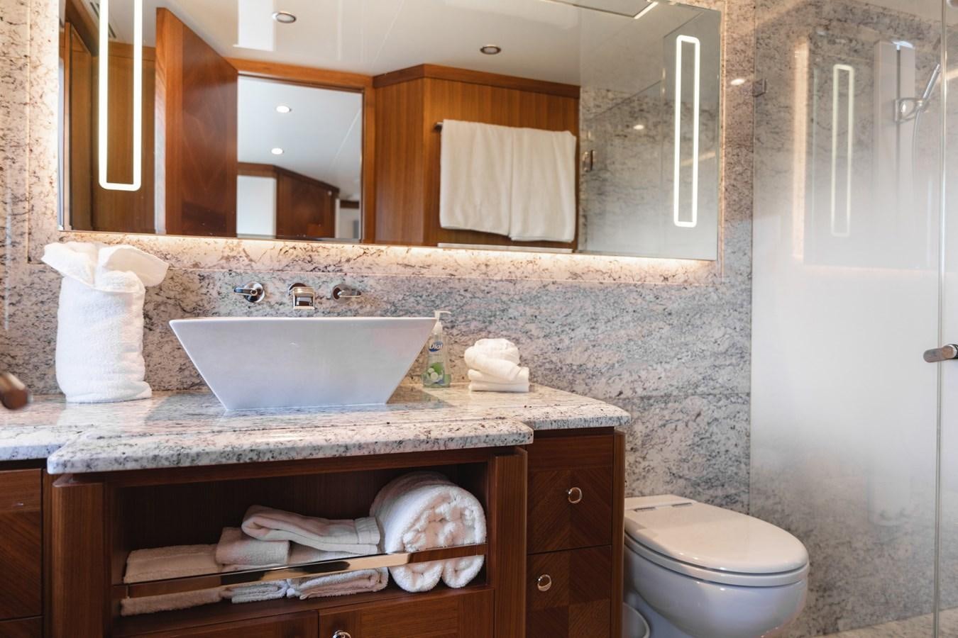 a bathroom with a sink and toilet aboard OCEAN ROSE Yacht for Sale