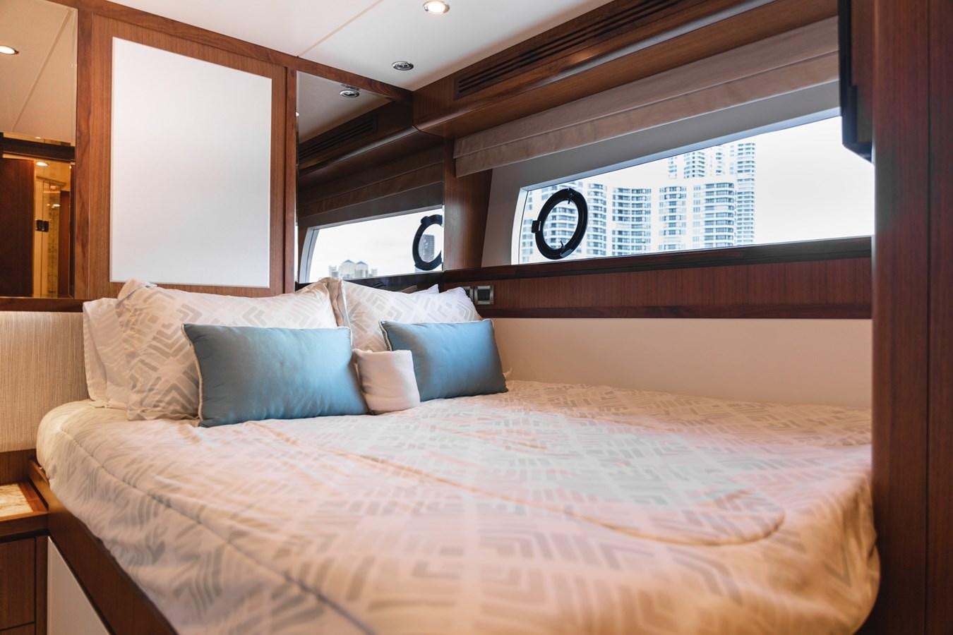 a bed with pillows aboard OCEAN ROSE Yacht for Sale