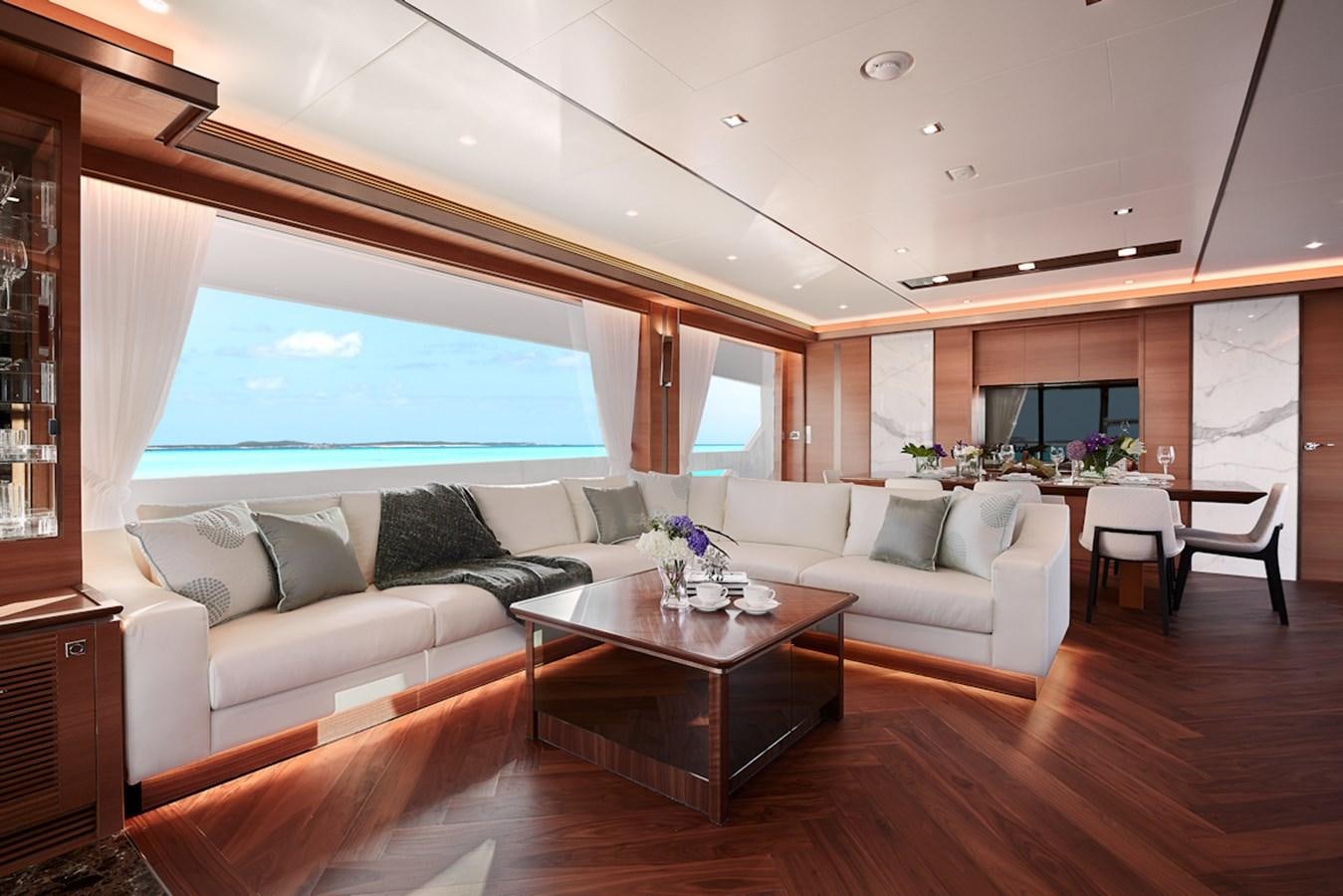 a living room with a couch and a coffee table aboard FD85 (NEW BOAT SPEC)  Yacht for Sale