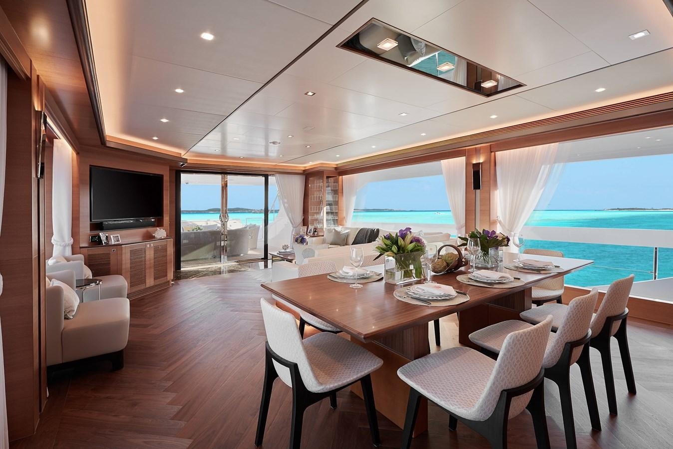 a dining room with a large table aboard FD85 (NEW BOAT SPEC)  Yacht for Sale