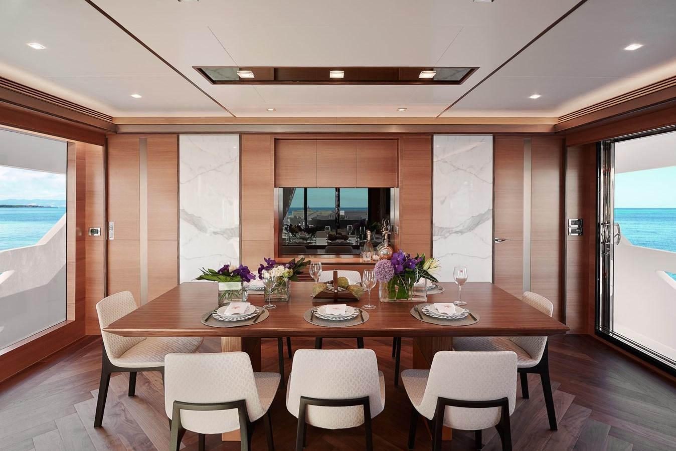 a dining table in a room aboard FD85 (NEW BOAT SPEC)  Yacht for Sale