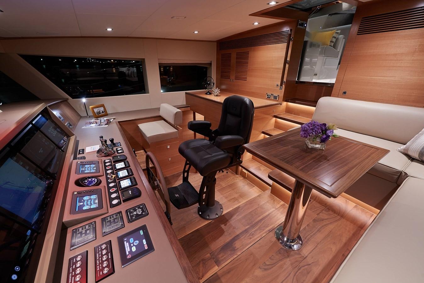 a room with a table and chairs aboard FD85 (NEW BOAT SPEC)  Yacht for Sale