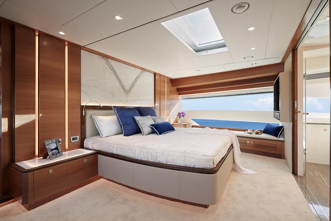 a room with a bed and a television aboard FD85 (NEW BOAT SPEC)  Yacht for Sale