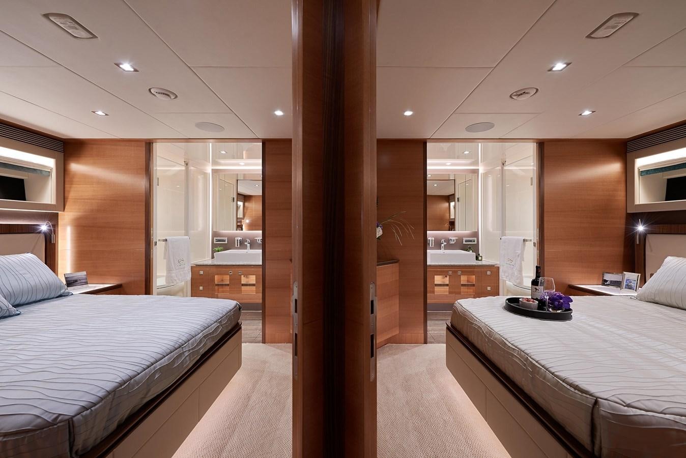 a room with a bed and a mirror aboard FD85 (NEW BOAT SPEC)  Yacht for Sale