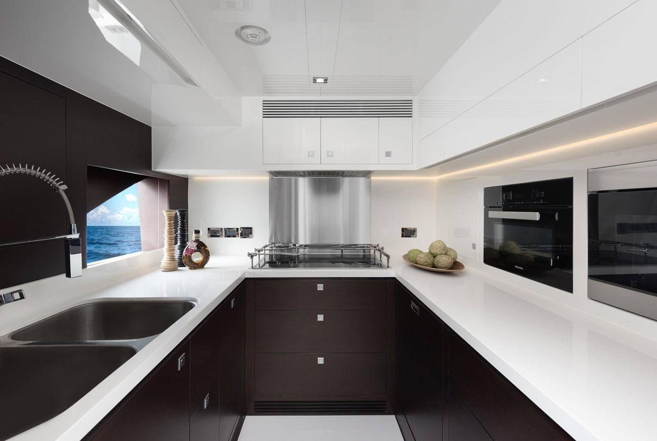 a kitchen with white cabinets aboard FD85 (NEW BOAT SPEC)  Yacht for Sale