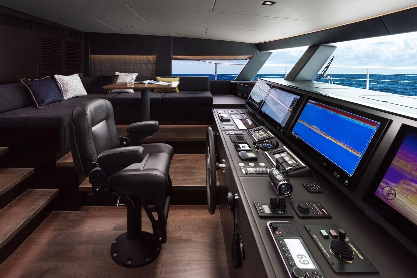 a room with a tv and a couch aboard FD85 (NEW BOAT SPEC)  Yacht for Sale