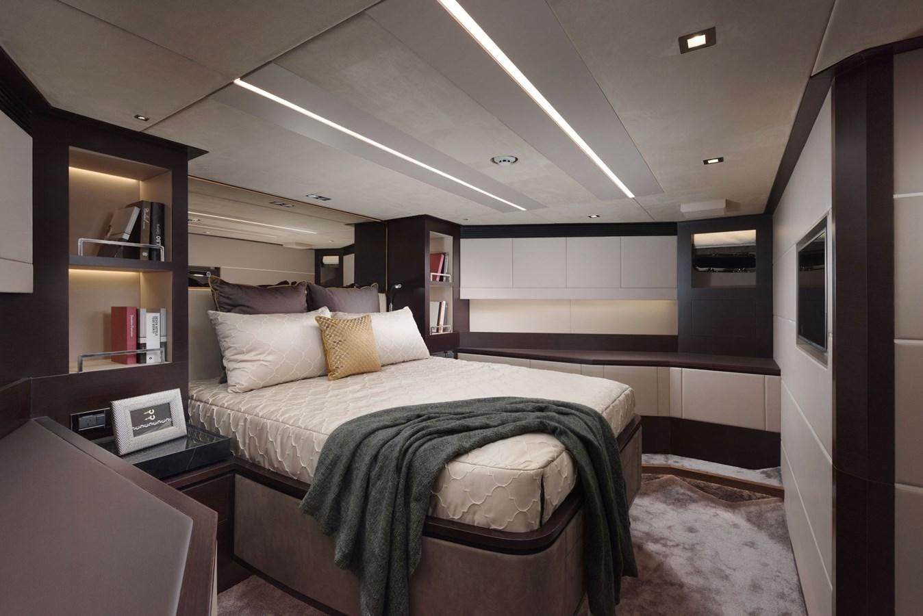 a bedroom with a bed and a desk aboard FD85 (NEW BOAT SPEC)  Yacht for Sale