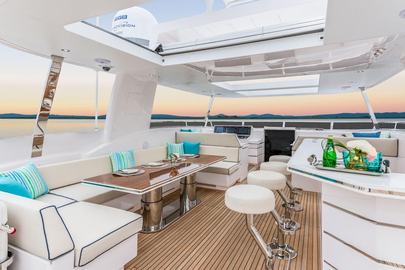 a room with a table and chairs aboard FD85 (NEW BOAT SPEC)  Yacht for Sale