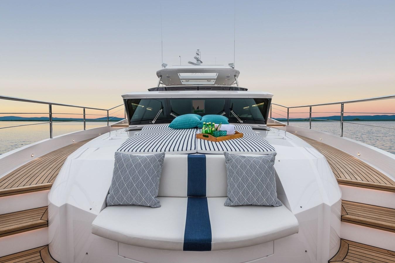 a white car on a balcony aboard FD85 (NEW BOAT SPEC)  Yacht for Sale