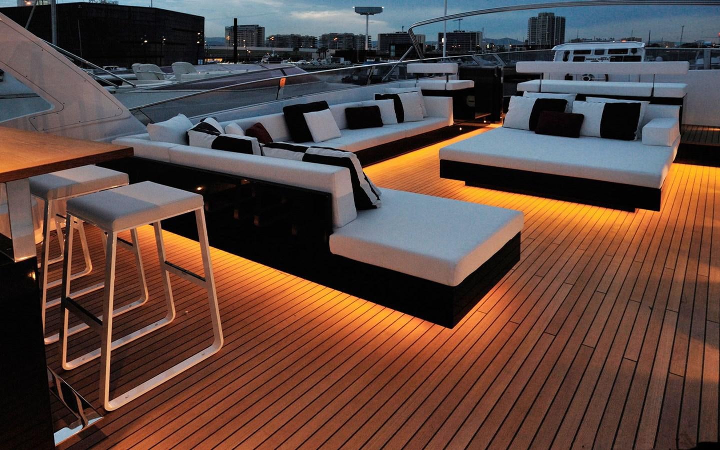 a room with a large deck aboard PETARDO C Yacht for Sale