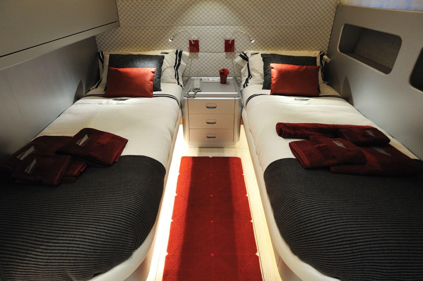 a couple of beds in a room aboard PETARDO C Yacht for Sale