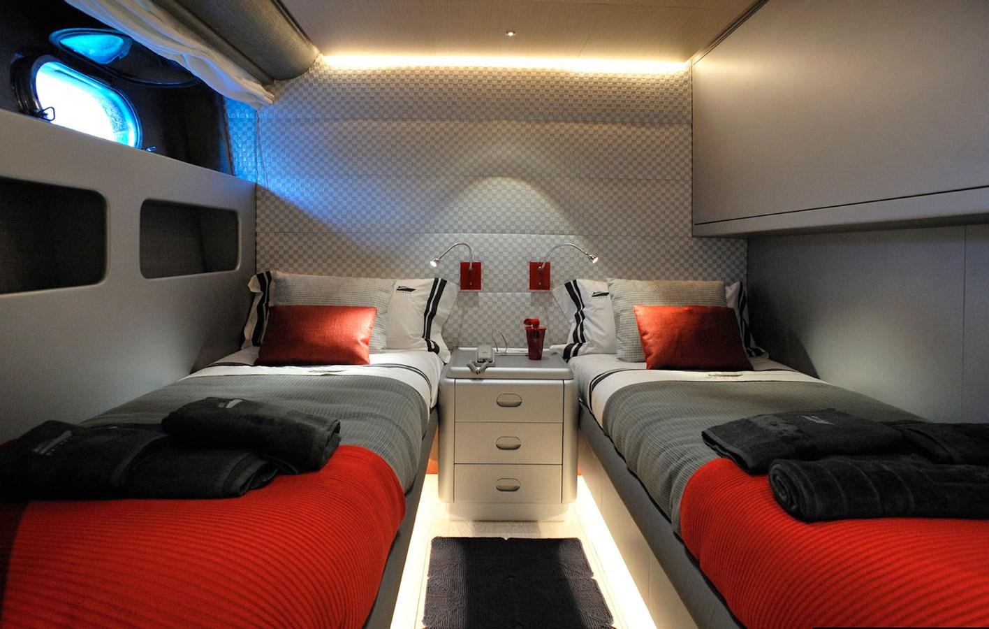 a couple of beds in a room aboard PETARDO C Yacht for Sale