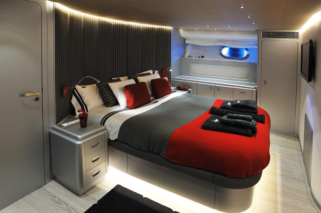 a bed in a room aboard PETARDO C Yacht for Sale