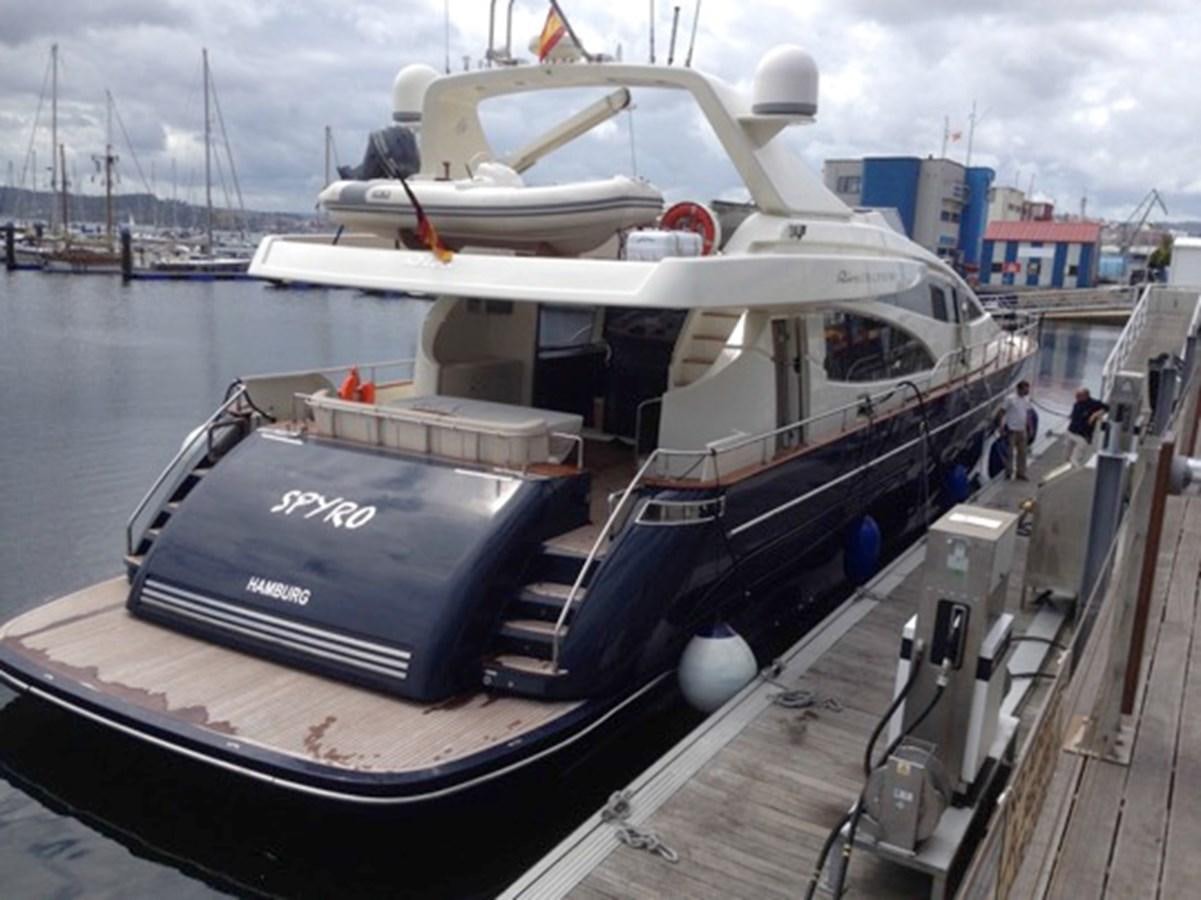a boat on a dock aboard RIVA 85 OPERA Yacht for Sale
