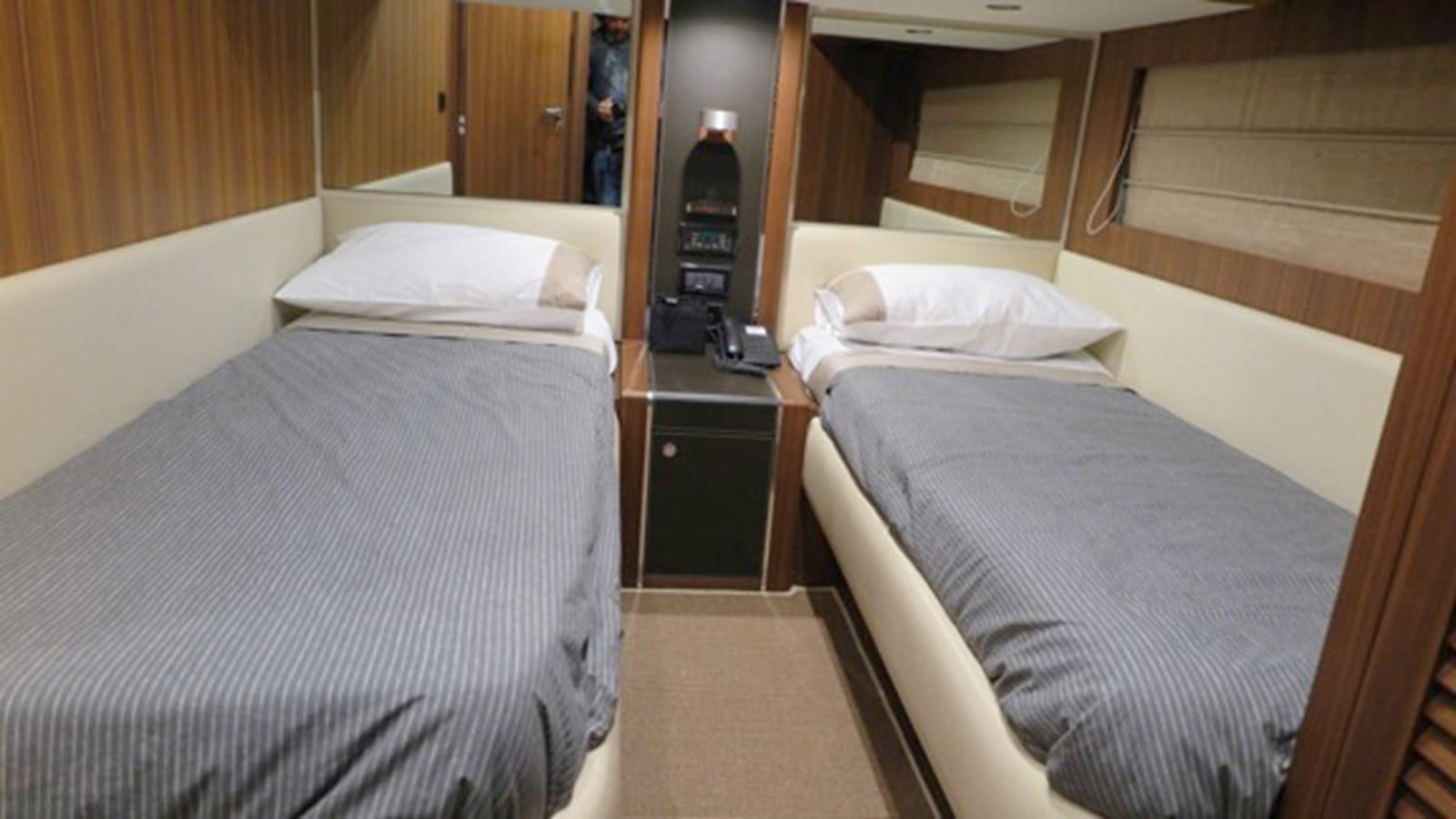 a room with two beds aboard RIVA 85 OPERA Yacht for Sale