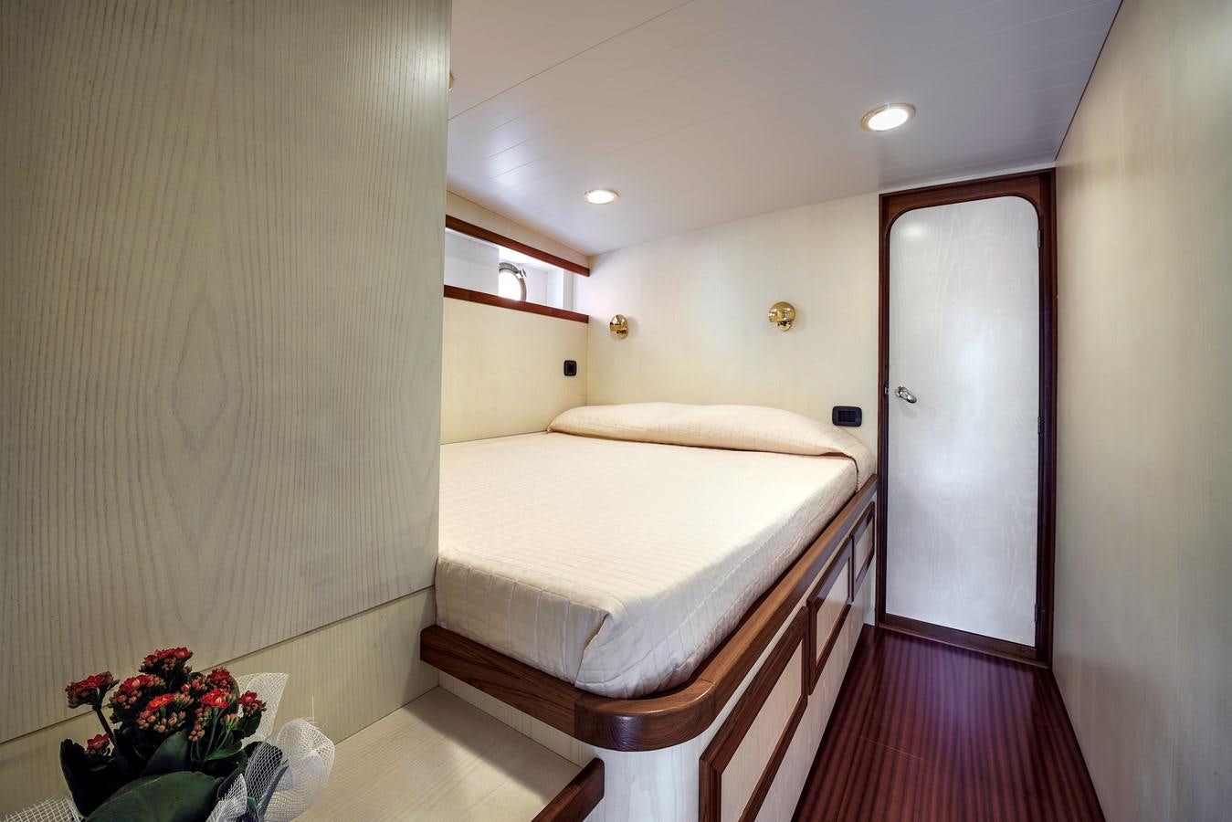 a bed in a room aboard EMERALD Yacht for Sale