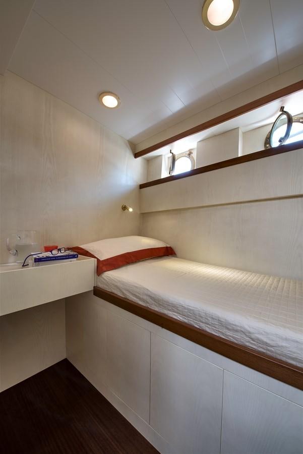 a room with two beds aboard EMERALD Yacht for Sale