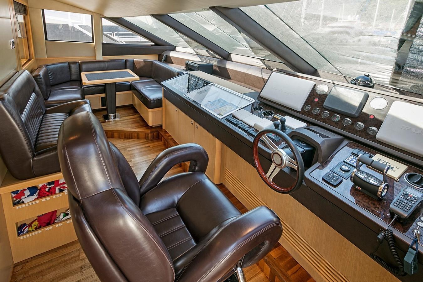 a room with a desk and chairs aboard DREAM ON Yacht for Sale