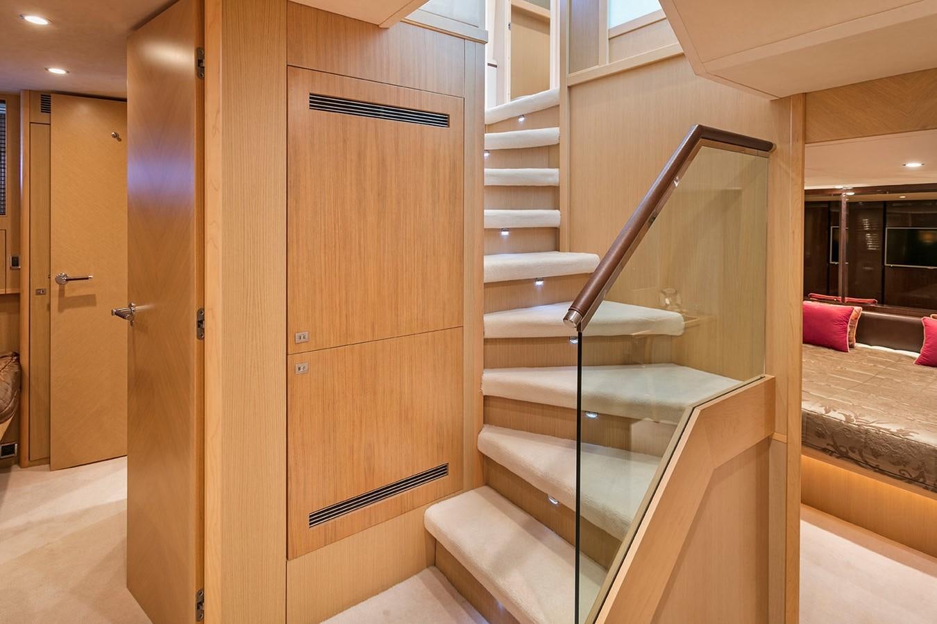 a room with a closet and a bed aboard DREAM ON Yacht for Sale