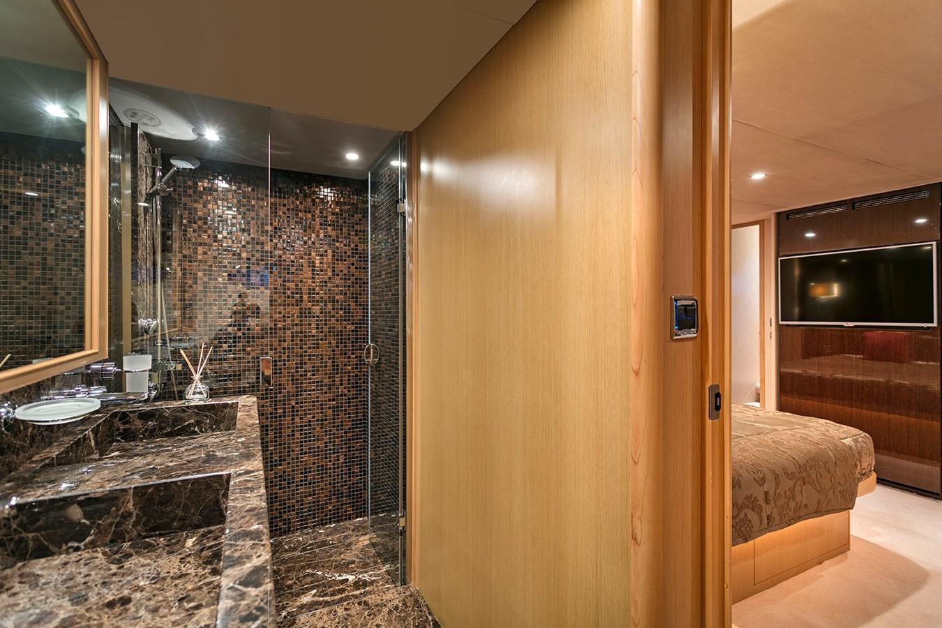 a bathroom with a glass shower aboard DREAM ON Yacht for Sale