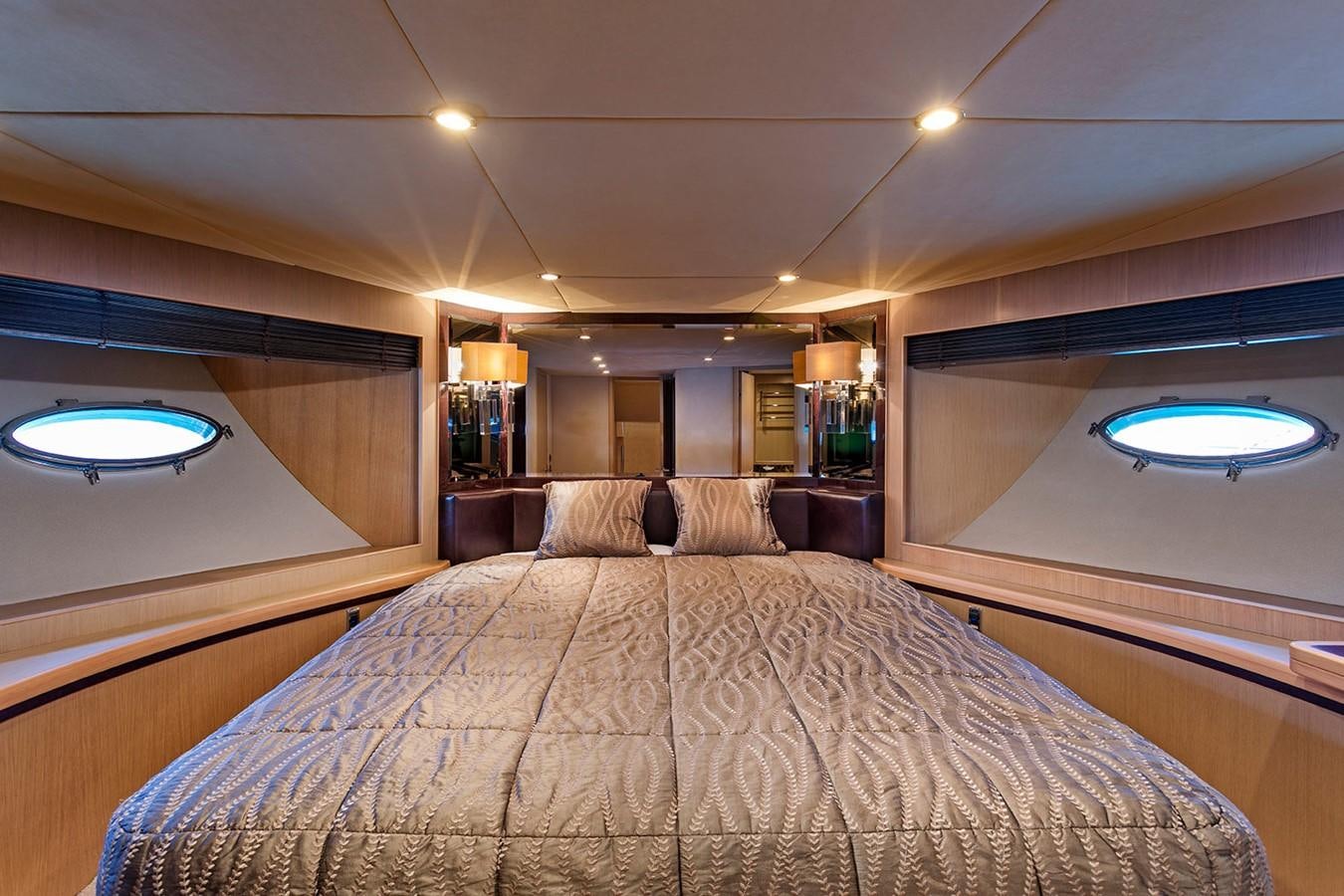 a large bed in a hotel room aboard DREAM ON Yacht for Sale