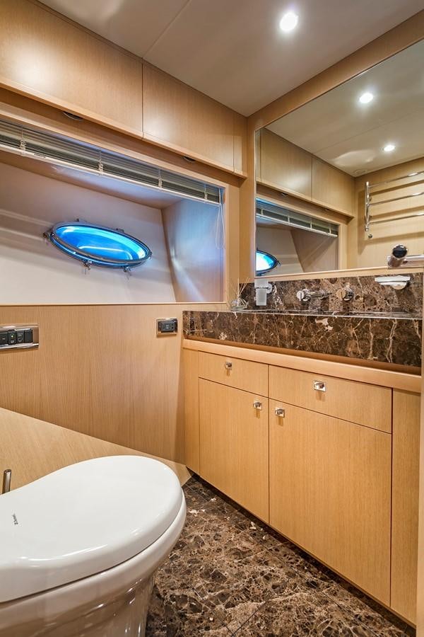 a bathroom with a marble counter top aboard DREAM ON Yacht for Sale