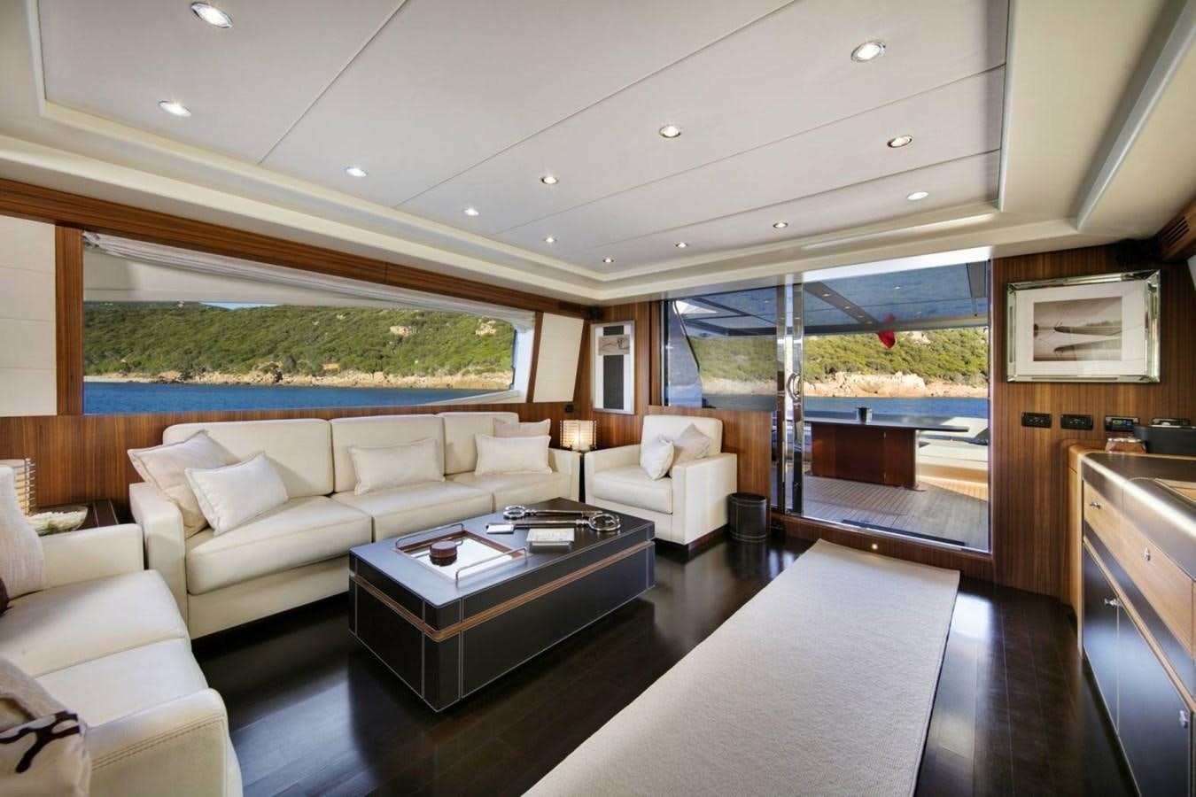 a living room with a large window aboard BLACK PEARL AJACCIO Yacht for Sale