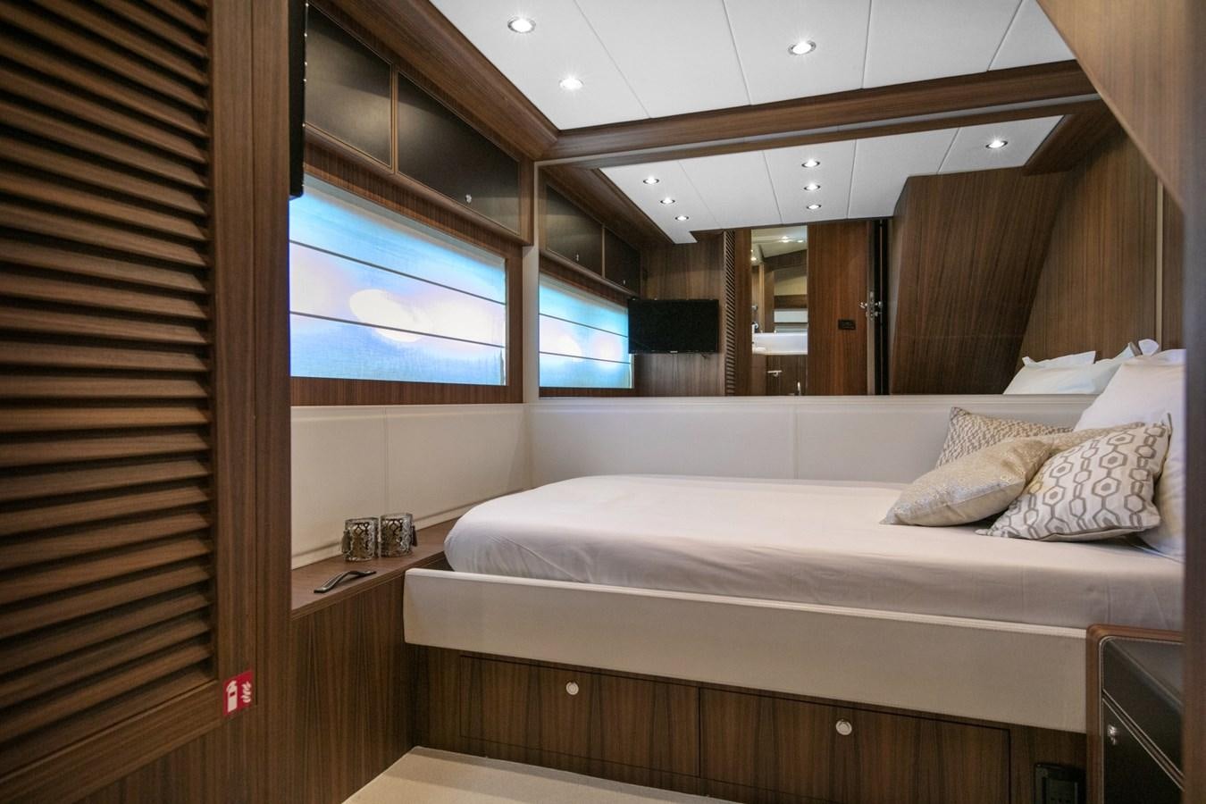 a bed in a room aboard BLACK PEARL AJACCIO Yacht for Sale