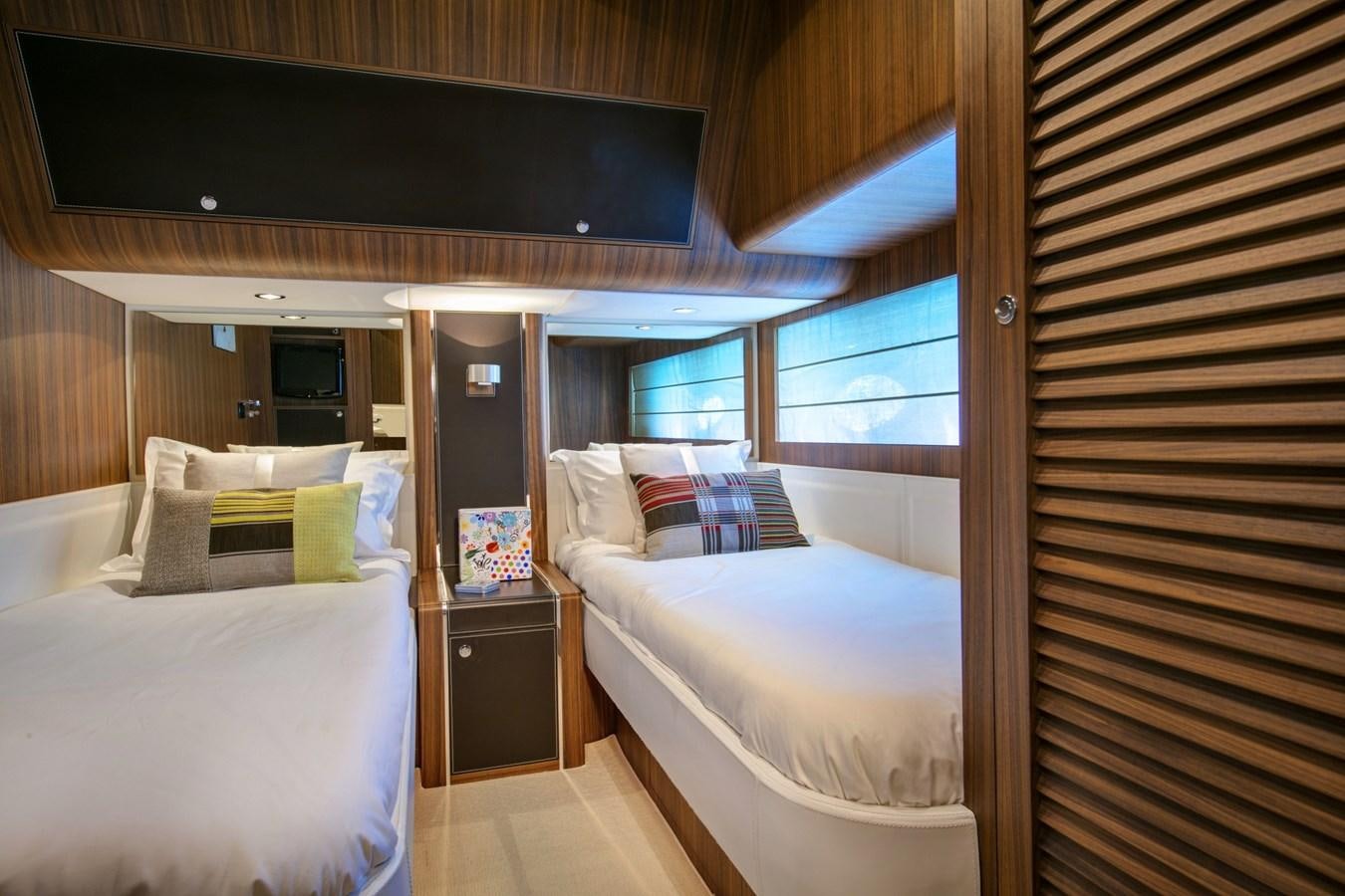 a room with two beds aboard BLACK PEARL AJACCIO Yacht for Sale