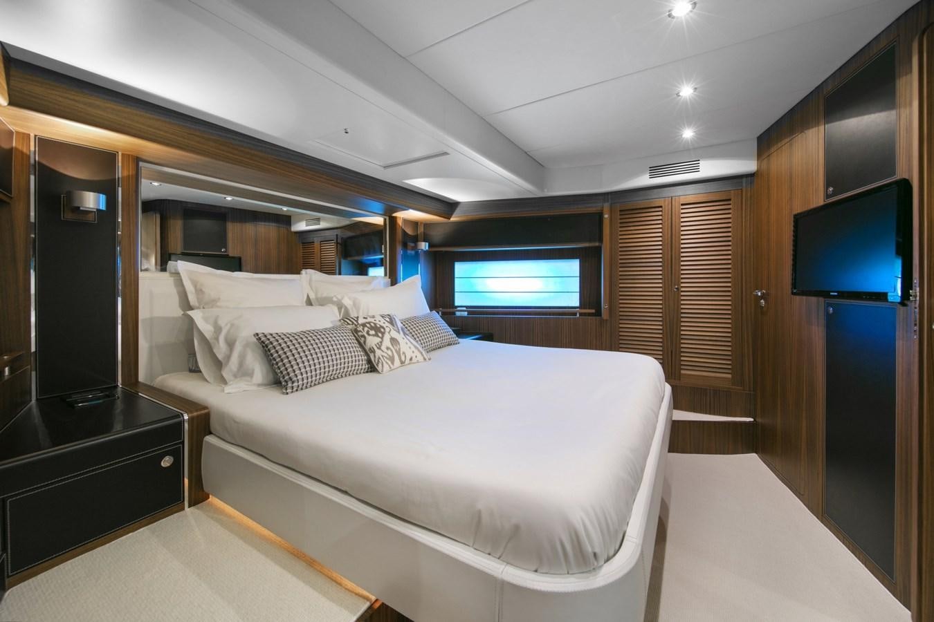 a large bed in a room aboard BLACK PEARL AJACCIO Yacht for Sale