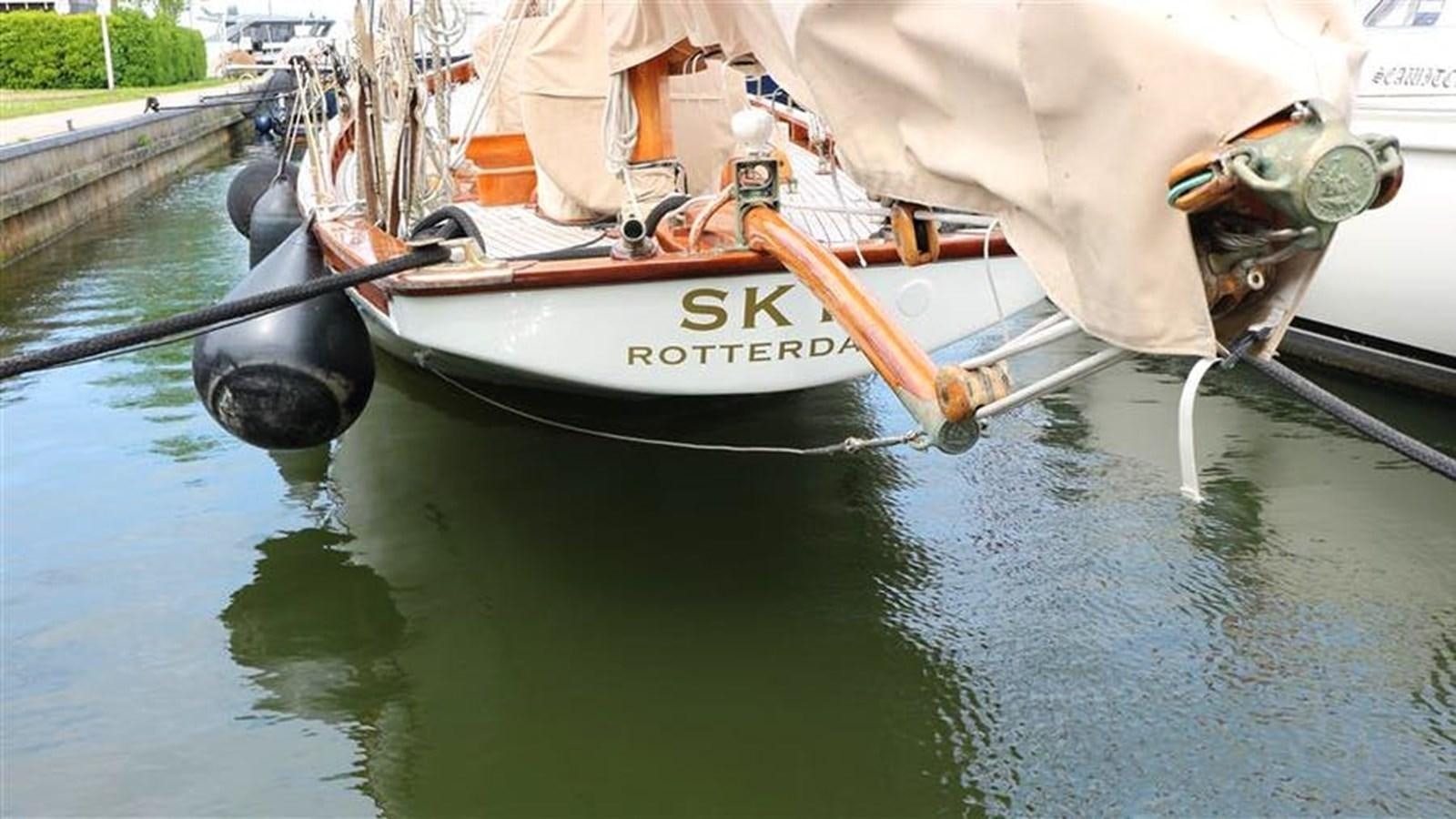 a person holding a boat aboard SKY Yacht for Sale