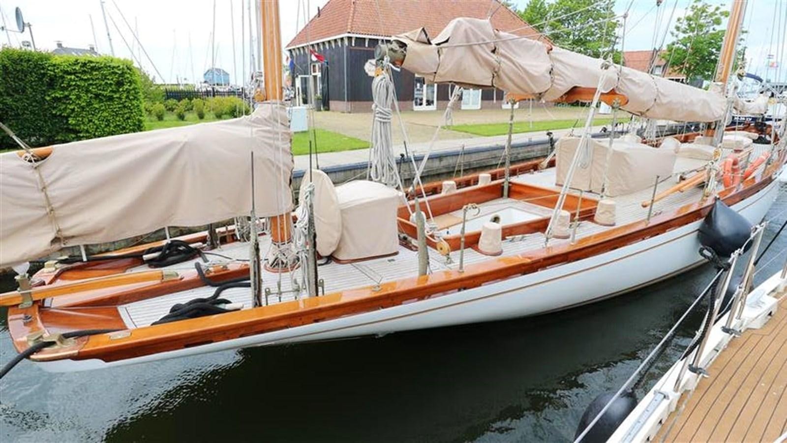 a group of boats are parked in a harbor aboard SKY Yacht for Sale