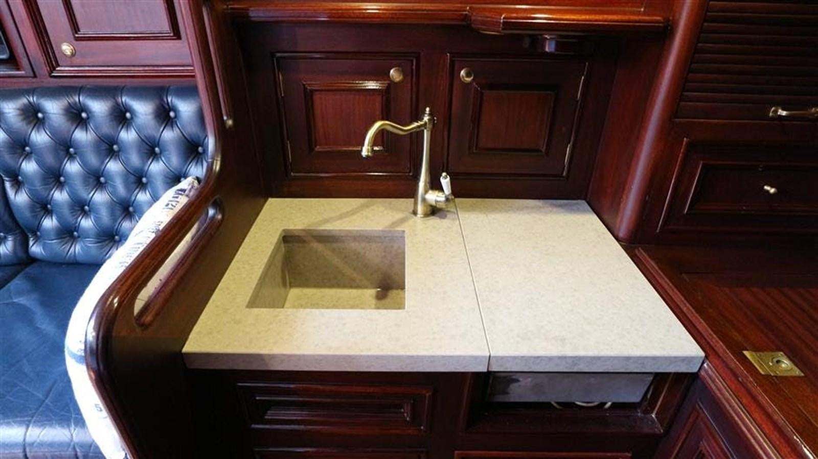 a sink in a kitchen aboard SKY Yacht for Sale