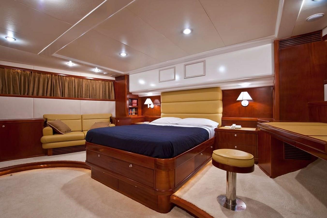 a room with a bed and a couch aboard BELEZA Yacht for Sale