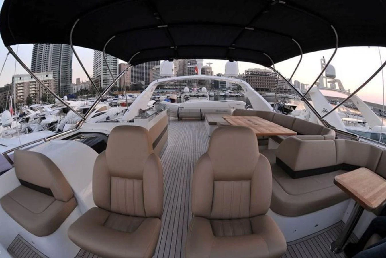 a couple of people sitting on a boat in a large body of water aboard PRINCESS 85MY Yacht for Sale