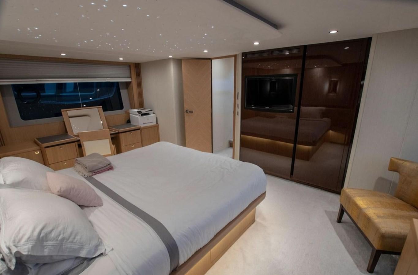 a bed in a room aboard MOONDANCER Yacht for Sale