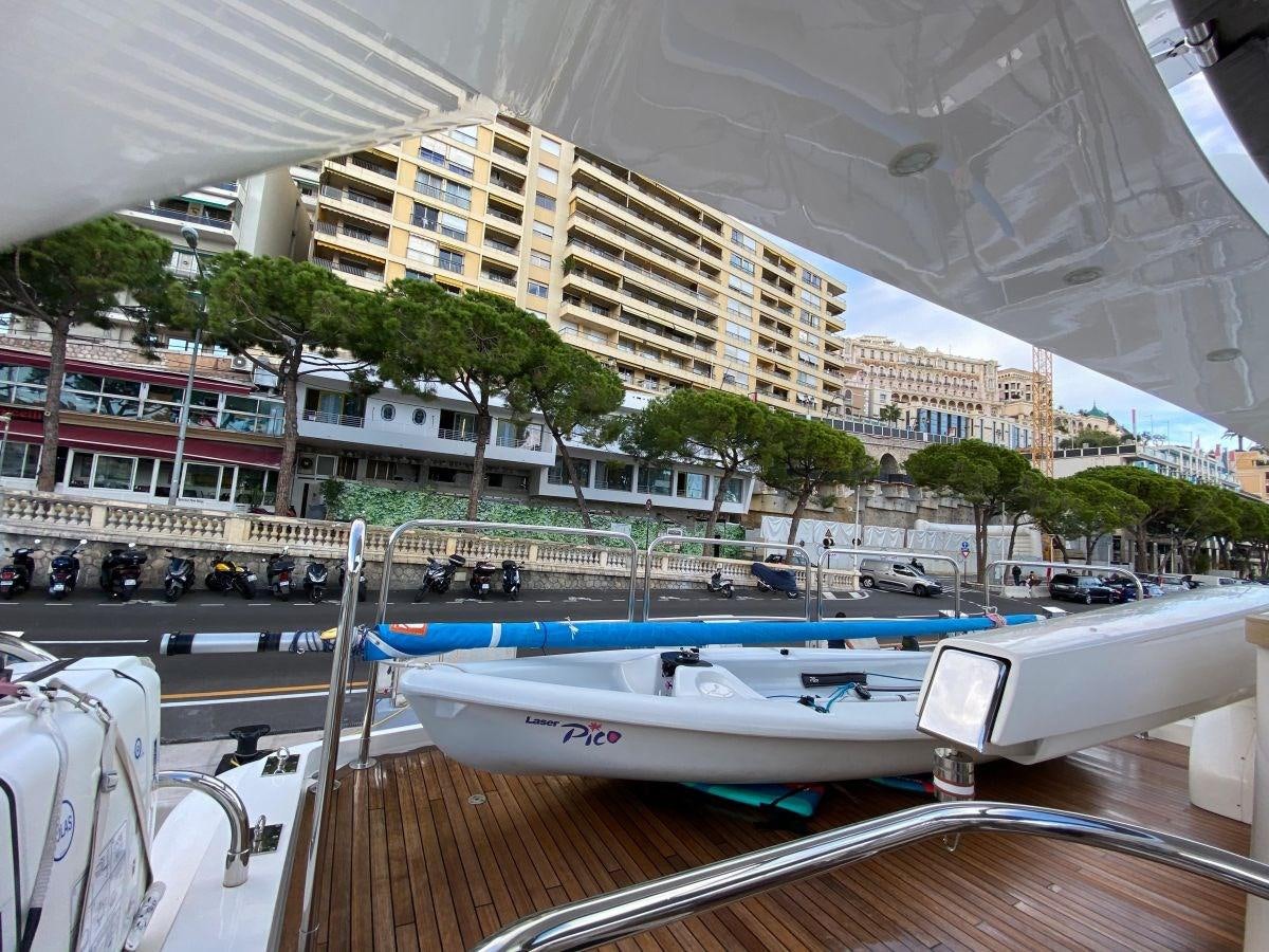 a boat in a harbor aboard MOONDANCER Yacht for Sale