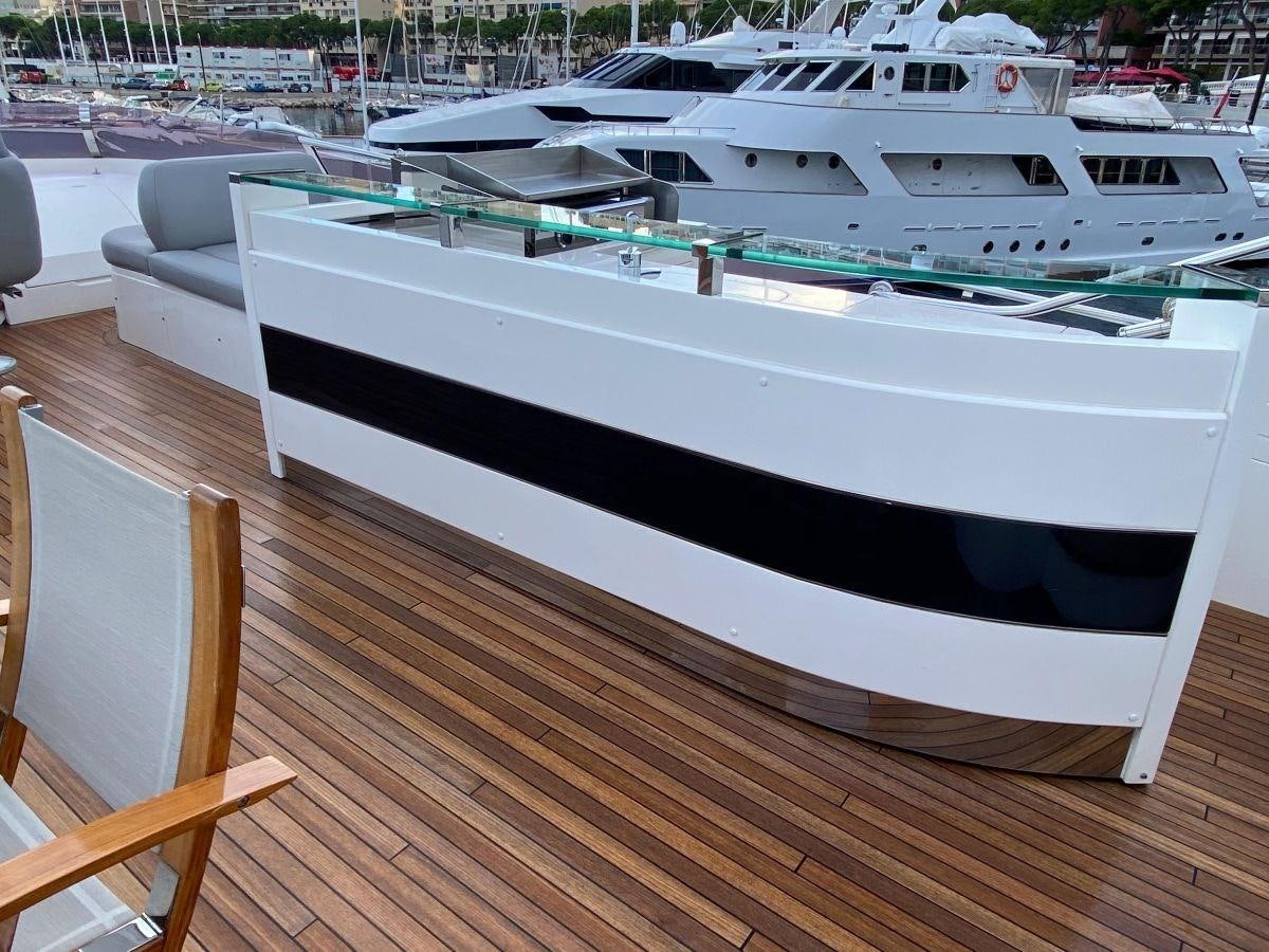 a boat on a dock aboard MOONDANCER Yacht for Sale
