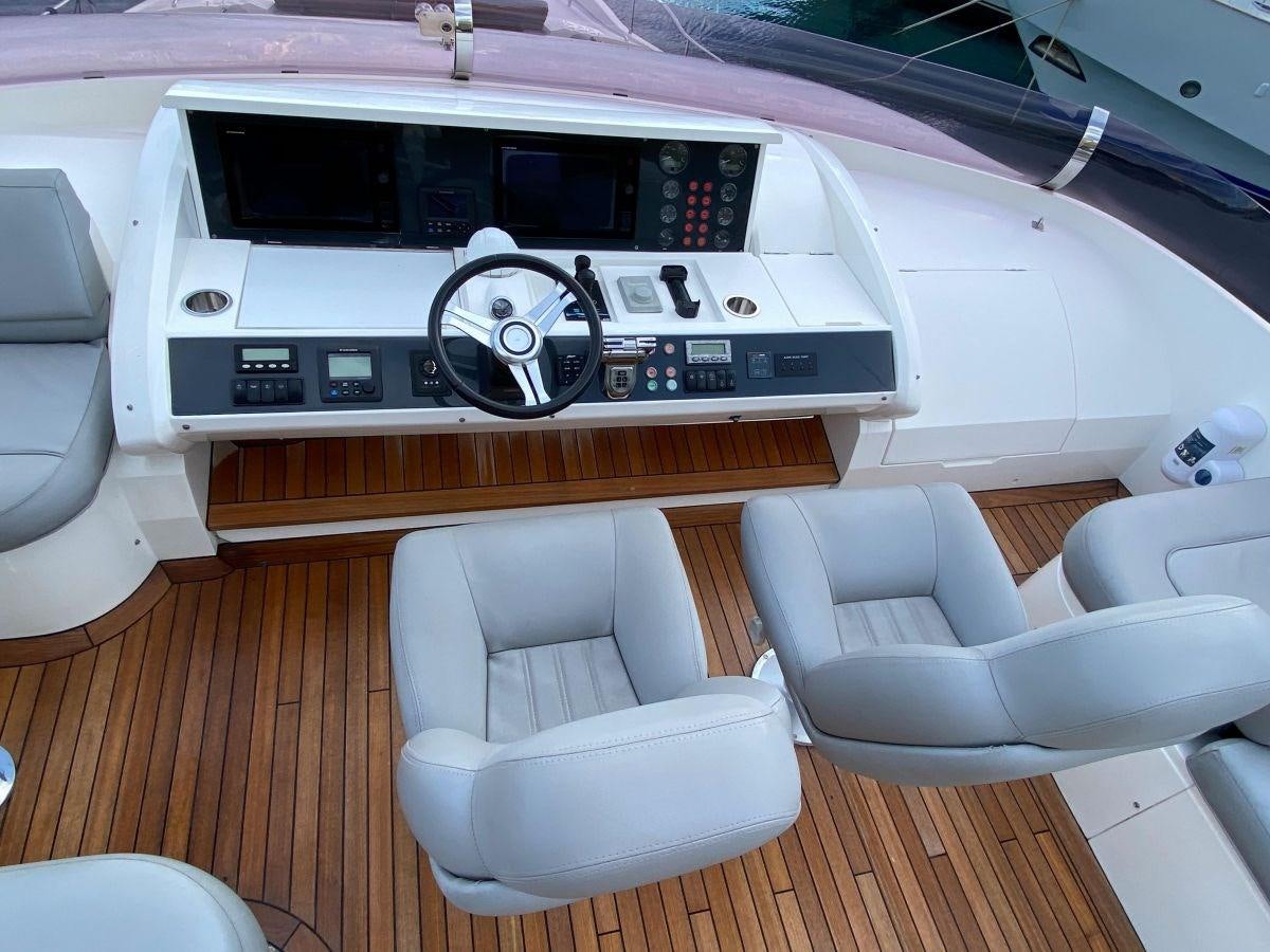 inside of a car aboard MOONDANCER Yacht for Sale
