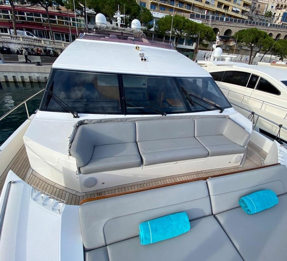 a boat on a dock aboard MOONDANCER Yacht for Sale