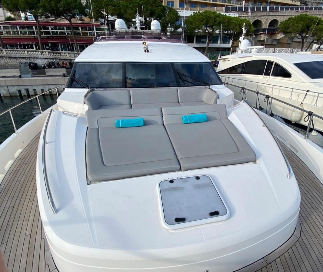 a white car on a bridge aboard MOONDANCER Yacht for Sale